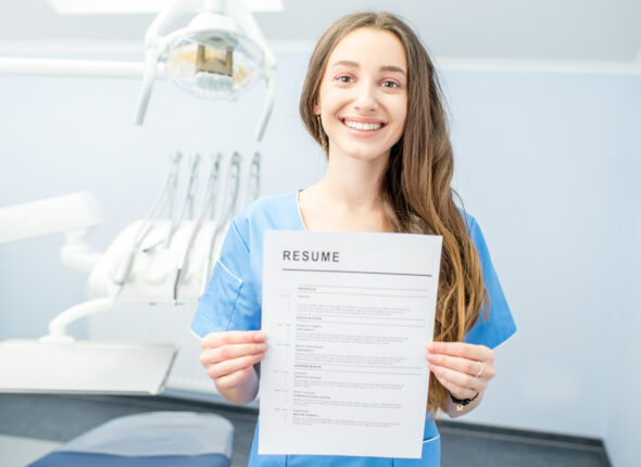 Young,Dentist,Assistant,Or,Student,Holding,Resume,For,A,Job