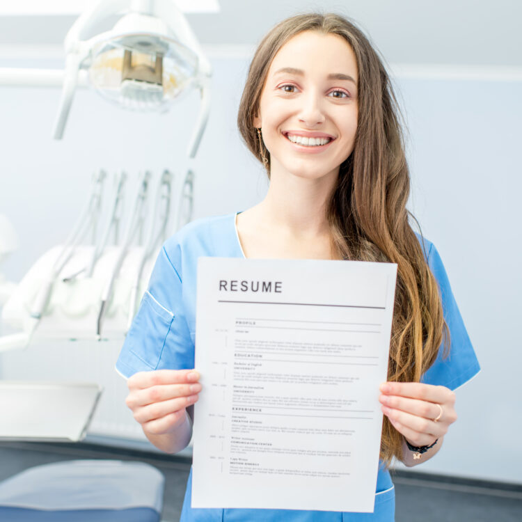 Young,Dentist,Assistant,Or,Student,Holding,Resume,For,A,Job